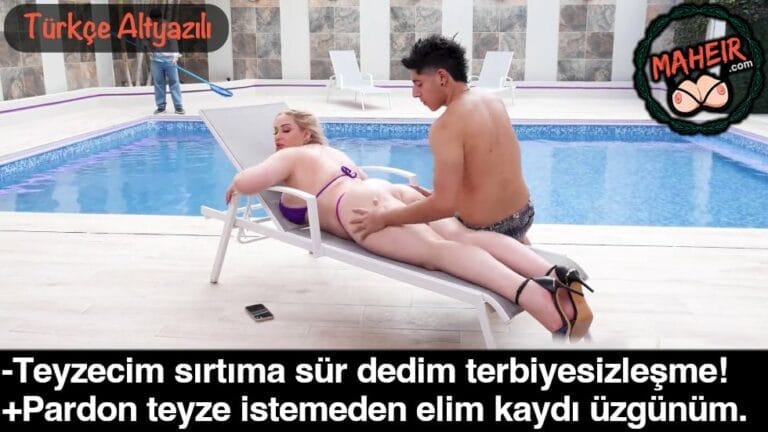 havuz basinda guneslenen teyzeme yag surerken salakta elliyorum.jpg